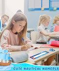 Student writing with 64 Piece Nautical Classroom Decor Bundle With Nameplates And Sailing Paper Cutouts Plus Glue Dot Sheets in classroom.