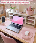 Nine Piece Cute Pink Desk Accessories Set for Women with rotating pen holder, desk mat, wrist rest, and phone stand.
