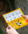 LockNLube grease fitting multi-tool, large; open yellow plastic case with assorted fittings