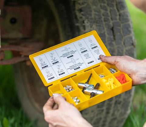 LockNLube grease fitting multi-tool, large; open yellow plastic case with assorted fittings