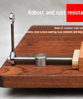 Close-up of 2 Pack Bench Dog Clamps for 20mm or 7.9 inch holes, stainless steel body with brass block on a wooden desktop.