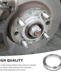 4 Piece Hub Centric Rings 56 Mm To 73 Mm Wheel Center Bore Spacers durable aluminum alloy hub adapter installed on vehicle wheel.