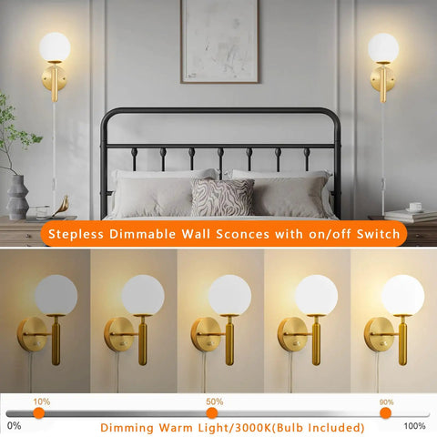 Gold Glass Globe Wall Sconce Light With Mid Century Vibe shown in a bedroom setting over bed, dimmable feature displayed