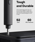 Close-up of Ultra Portable Electric Precision Screwdriver Set With 49 S2 Steel Bits demonstrating use on a device surface.