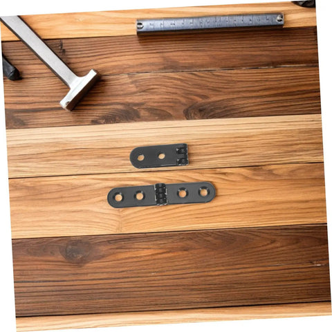 Heavy Duty Folding Table Hinges Set 12 Pieces Black Round Edge Desk Hinge Hardware 76x15x2mm on wooden surface
