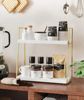 Two Tier Wooden Coffee Bar Organizer For Countertop And Corner Spaces with coffee accessories and mugs on white-gold shelves