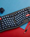Built Different For Marathon Sessions This 75 Percent Alice Layout Wireless Mechanical Keyboard with blue keycaps on a colorful background.