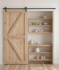 Heavy Duty Sliding Barn Door Hardware Kit For 60 Inch Wide Doors Up To 330 Lbs With Thickness Range Between One And Three Eighths And One And Three Quarters Inches Thick, Durable Carbon Steel Track And J Shape Rollers In Black Finish, Quiet Operation installed in a room with a natural wood sliding door.