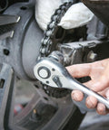 Person using 72-Tooth Ratchet Repair Kit For Three Eighths Inch Drive Wrenches, Medium Size Only, on mechanical part
