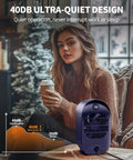 Portable Indoor Space Heater With 2 Second Instant Heating For Quick Warmth At Your Desk Or In The Bedroom in front of woman with coffee