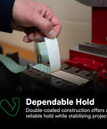Hand applying Double Coated Paper Adhesive Tape 410M Natural 1 in x 36 yd 5 mil for dependable hold in assembly setup