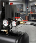 Close-up of an air compressor pressure switch with 4-way valve and regulator 0 to 180 psi, dual voltage 110/240V in a workshop.