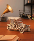 3D Wooden Puzzle Car Kit For Adults And Teens One To Fifteen Scale Vintage 1910s Classic Car Model on table, assembled.