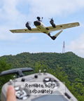 ZOHD Altus 980mm Wingspan Twin Motor V Tail EPP FPV RC Airplane flying over lush hills, remote in foreground, for outdoor adventures