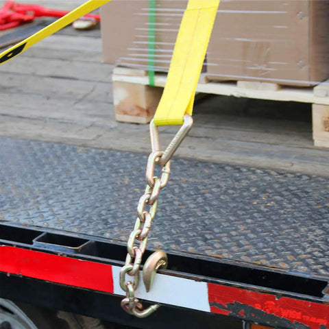 Beefy Two Strap System With 4 Inch By 30 Foot Heavy Duty Winch Straps With Chain End And Grab Hook Securing Load on Flatbed