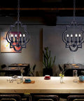 Black Farmhouse 4-Light Chandelier With Adjustable Chain, Lantern Style Pendant Light hanging over dining table