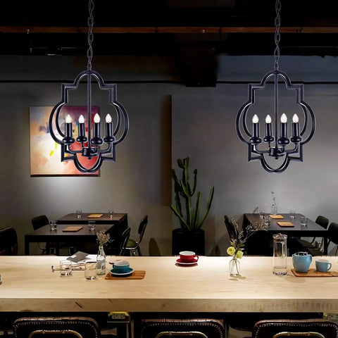 Black Farmhouse 4-Light Chandelier With Adjustable Chain, Lantern Style Pendant Light hanging over dining table