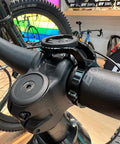 Close-up of 35mm Handlebar Bike Stem Mount For Garmin Edge Wahoo ELEMNT Bryton Rider Stages Dash on black handlebars