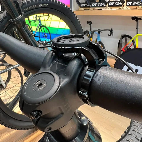 Close-up of 35mm Handlebar Bike Stem Mount For Garmin Edge Wahoo ELEMNT Bryton Rider Stages Dash on black handlebars