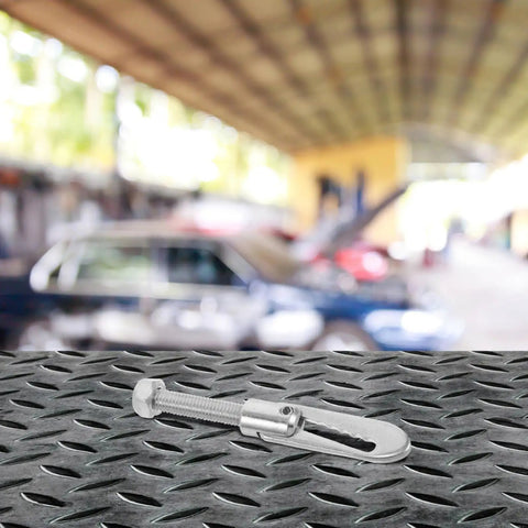 Rock-Solid Alloy Trailer Locking Pin With Long Screw For Secure Hitch Connector on metal surface, showcasing durability and quick release.