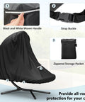 Heavy Duty 73 Inch Waterproof Patio Hanging Chaise Lounge Cover With Handle Bombproof Durable 600D UV Protected All Weather Outdoor Hammock Chair Swing Protector Black with black and white woven handle, strap buckle, and zippered storage pocket.