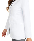 Side view of womens white lab coat with five pockets full sleeve 5160 Flo relaxed fit exam coat for medical professionals minimalist collection XL button front closure for easy on and off