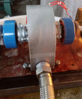2KW Hydro Turbine Generator With Dual Voltage 110V Or 220V For Off Grid Power, showing side view on wooden base