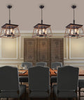 Farmhouse Rustic Chandelier With Antique Geometric Industrial Design In Bronze Four Light Hanging Fixture Over Dining Room Table