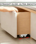 Built Tough 0.5 Inch Double Roller Mini Caster Wheels With Flat Steel Mount shown under a cabinet for smooth drawer gliding.