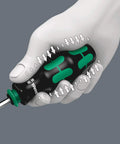 Hand holding a Replacement Driver Bit Set with Rapidaptor Quick Release and Bayonet Blade Built in Bit Storage handle