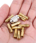 Pro Grade Quick Change Drill Chuck Reducer Adapter for Cordless rotary Tools in hand with copper collets.