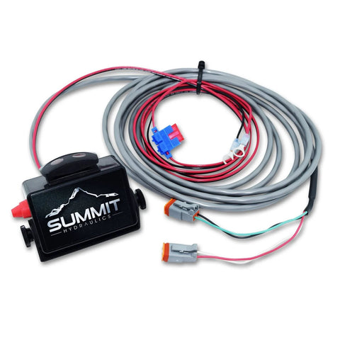 Front view of Summit Hydraulics switch box control with bundled gray hydraulic hoses and orange connectors