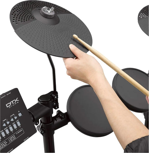 Person playing cymbal on DTX-PRO Electronic Drum Trigger Module With 70 Premium Customizable Kits, Kit Modifier Controls.