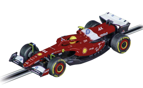 Red 1:43 scale slot car from High Speed Slot Car Race Track Set With Over Fourteen Feet Of Track Crossover Section Long Straights And Lap Counter