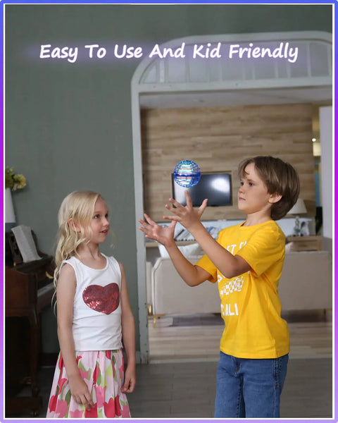 Two kids playing with Hand Controlled Flying Orb With Lights Boomerang Drone For Kids Indoor Outdoor Fun in living room setting.
