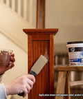 Applying Premium White Wood Filler 16 Oz 3 In 1 Stainable Grain Filler And Sealer Coat Pro Grade Knife Grade Acrylic Latex to wood banister