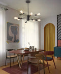 8 Light Dope Modern Industrial Ceiling Chandelier With Adjustable Height Black Finish in a dining room setting
