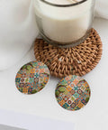 Fresh Grid Print Dangle Earrings for Women Lightweight Silver Plated Faux Leather Statement Drops With Hypoallergenic Rust Proof Hooks Slaying Casual Daily Looks All Day Long on a table with a candle.