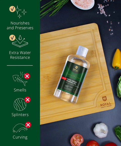 Bottle of Food Grade Mineral Oil For Bamboo And Wooden Cutting Boards And Kitchen Utensils on a wooden cutting board