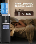 Three In One Water Dispenser With Built In Ice Maker Hot And Cold Water Cooler For Five Gallon Bottles in a bedroom setting