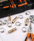 12 Piece Hose Repair Kit With Brass Barb Fittings For 5/8 To 3/4 Inch Hoses, stainless steel clamps, and tools on marble surface