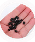 Slick Stainless Steel Hex Ball Plunger Screw Set For Cabinet Doors in a hand, showcasing durable black stainless screws.
