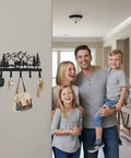 Deer Mountain Metal Key Holder Wall Mount For Rustic Cabin Decor Key Rack with Hooks installed in a family entryway.
