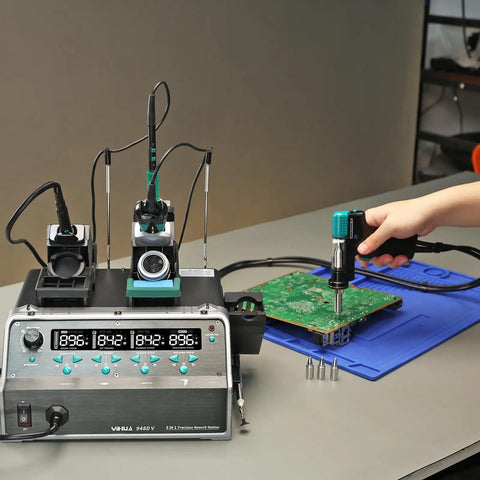 All-In-One Micro Soldering And Hot Air Rework Station With Microsoldering Iron in use on a circuit board under a microscope