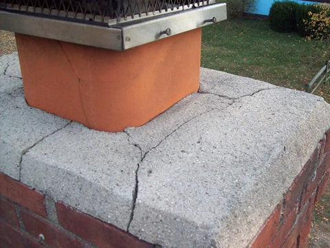 Cracked chimney crown requiring Elastomeric Waterproof Chimney Crown Repair Sealant For Masonry Trowelable Coating With Natural Concrete Finish