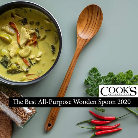 13.5 Inch Teak Cooking Spoon Wooden Mixing Spoon alongside a dish, herbs, and spices