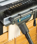 Dust Port Adapter For One And A Quarter Inch Vacuum Wand To Two And A Quarter Inch Port Vacuum Hose Durable Plastic Dust Collector Accessory For Attaching Shop Vac Dovetail Jig And Other Tools connected to a dovetail jig on a workshop table.