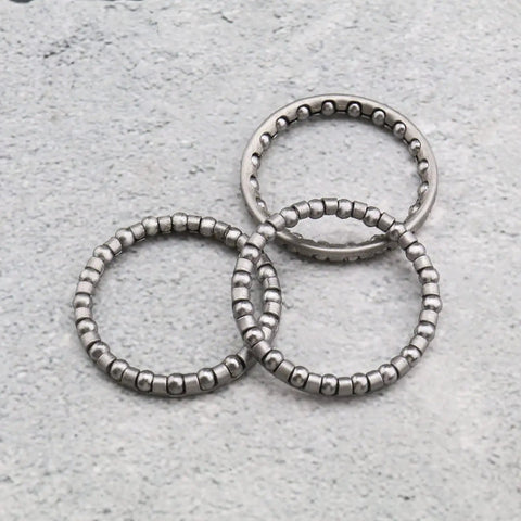 10Pcs Bicycle Ball Bearings Set For Mountain Bicycles And Fixed Gear Bikes With 40Mm Outer Diameter And 4Mm Ball Diameter Includes Steering Bearings For Headset Crank And Bottom Bracket Replacement Parts, showing three metal bearing rings.
