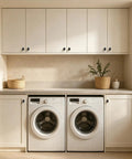 10 Pack Oval Zinc Alloy Cabinet Knobs With Straight Up Matte Black Finish on white laundry cabinetry