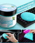Mint Scented Car Cleaning Gel 160g Aromatherapy Dust Buster For Air Vents And Hard To Reach Corners Soft Gel Grabs Dust In Dashboard Console Crevices And Cup Holders With Fresh Mint Aroma. Green gel cleaner on keyboard and car vent